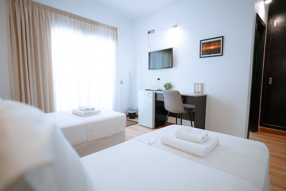 Habitación con 2 camas individuales del hotel Ventus. Foto 13