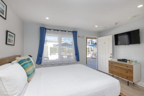 Habitación Doble con patio - cama grande del hotel Aqualina Inn Montauk. Foto 3