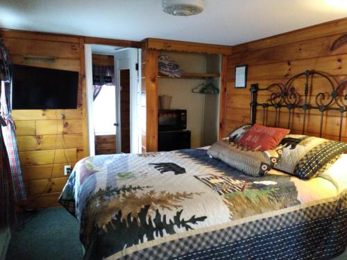 Suite Doble Deluxe - Cama grande del hotel Cramers Point & Cottages. Foto 8