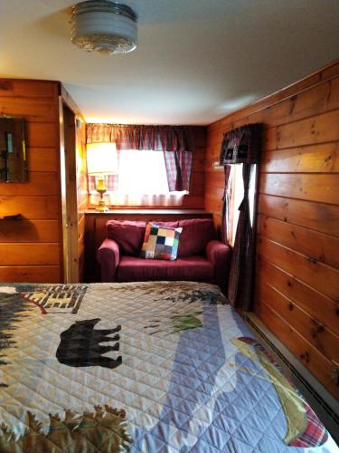 Suite Doble Deluxe - Cama grande del hotel Cramers Point & Cottages. Foto 9