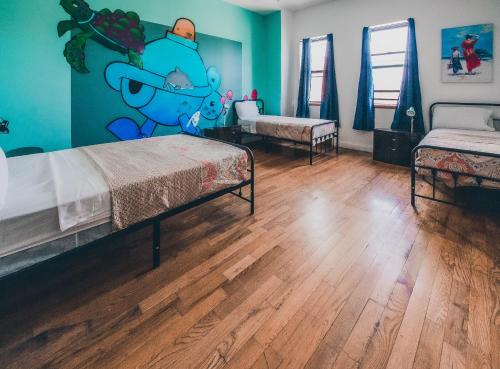 Cama individual en habitación compartida mixta con baño privado - 3 camas del hotel Ny Moore. Foto 6