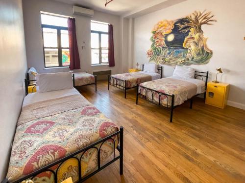 Cama individual en habitación compartida con baño privado - 4 camas - Solo mujeres del hotel Ny Moore. Foto 5