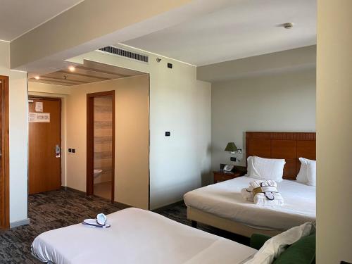 Habitación Familiar Clásica del hotel Mercure Rome Leonardo Da Vinci Airport. Foto 1