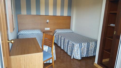 Habitación Familiar del hotel Troncoso. Foto 1