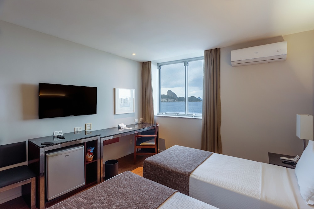 Habitación Deluxe con 2 camas individuales, 2 camas individuales, vistas al mar del hotel Orla Copacabana. Foto 1