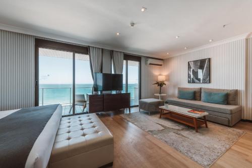 Suite King con Vista al Mar del hotel Pestana Rio Atlantica. Foto 1