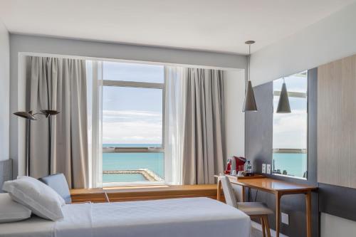 Habitación Doble Deluxe con vistas al mar - 2 camas del hotel Praiano. Foto 2