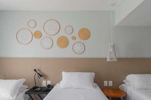 Habitación triple Superior Vista ciudad 3 camas individuales del hotel Praiano. Foto 4