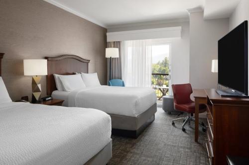 Suite con vistas al lago - 2 camas grandes del hotel Holiday Inn Resort Lake George - Adirondack Area, An Ihg. Foto 6
