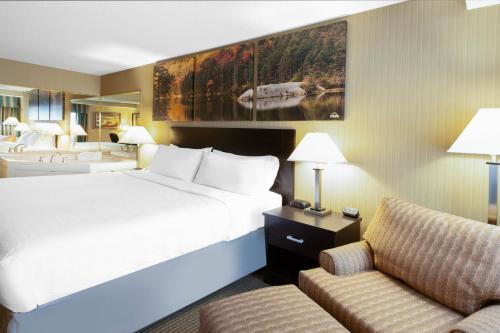 Habitación Deluxe con cama extragrande - No fumadores del hotel Days Inn by Wyndham Plattsburgh. Foto 2