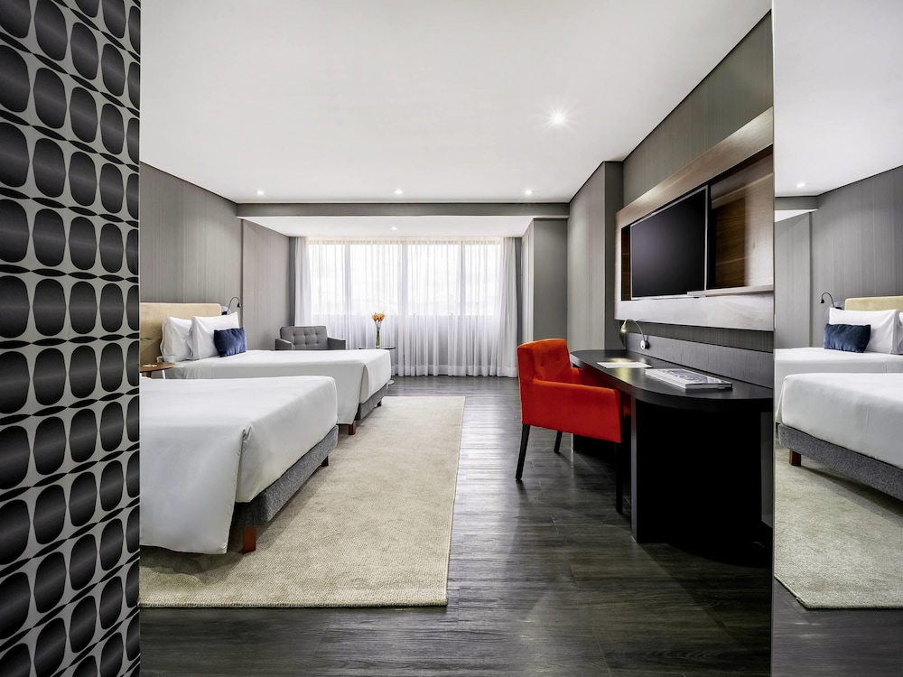 Habitación Deluxe con 2 camas individuales del hotel Grand Mercure Brasilia Eixo Monumental. Foto 8