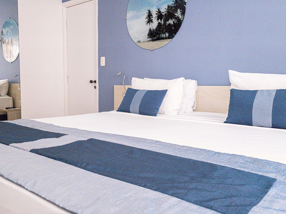 Habitación de categoría superior con una cama doble del hotel Mercure Recife Navegantes