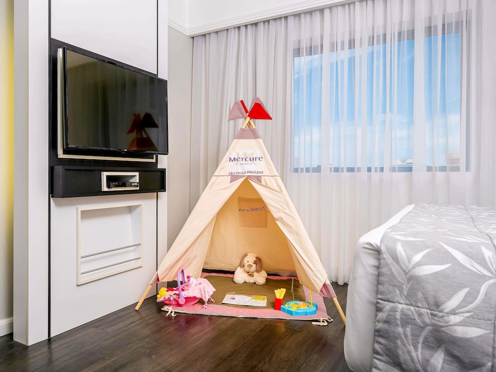 Apartamento Superior con 1 cama doble y 1 sofá cama para una persona del hotel Mercure Sao Paulo Ibirapuera Privilege. Foto 5