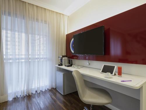 Habitación Doble Superior con balcón - 2 camas individuales del hotel Mercure São Paulo Paulista. Foto 4