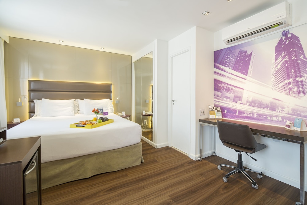 Apartamento Superior con cama King y vistas a São Paulo del hotel Mercure Sao Paulo Vila Olimpia. Foto 1