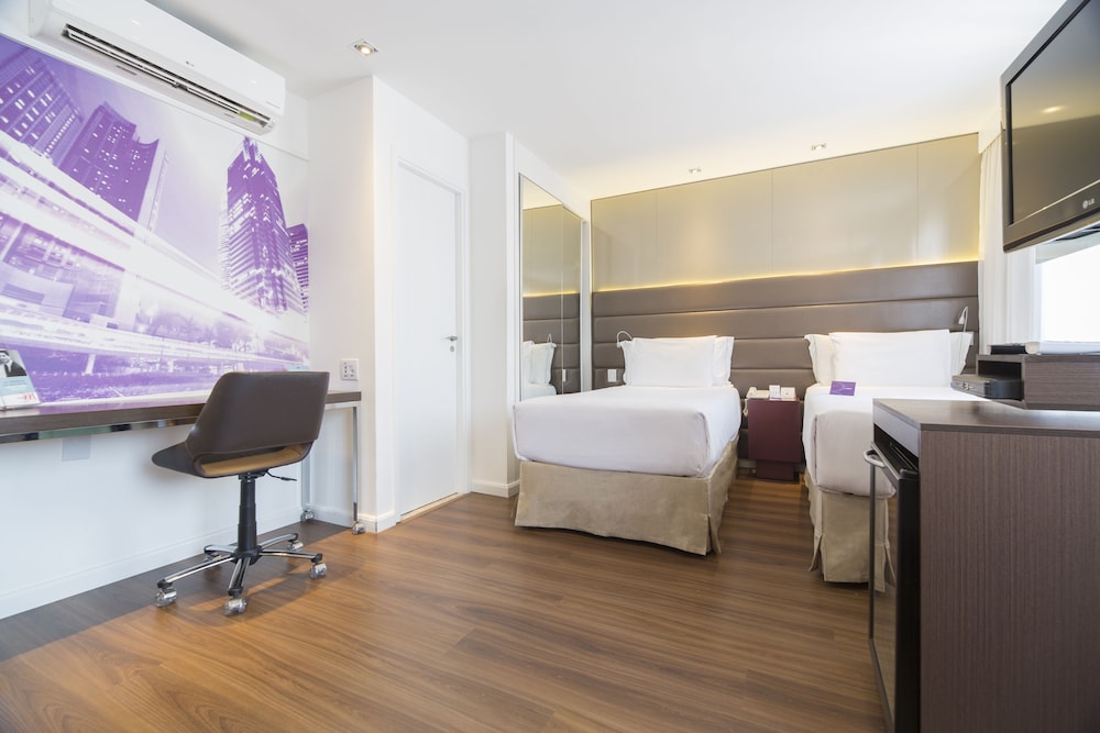 Apartamento Superior con 2 camas individuales y vistas a São Paulo del hotel Mercure Sao Paulo Vila Olimpia. Foto 3