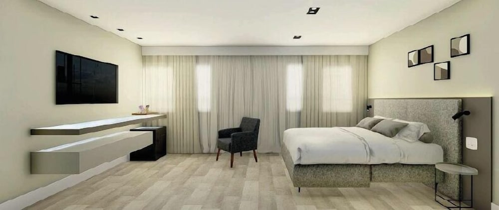 Habitación Deluxe con dos camas individuales del hotel Mercure Sao Paulo Vila Olimpia. Foto 2