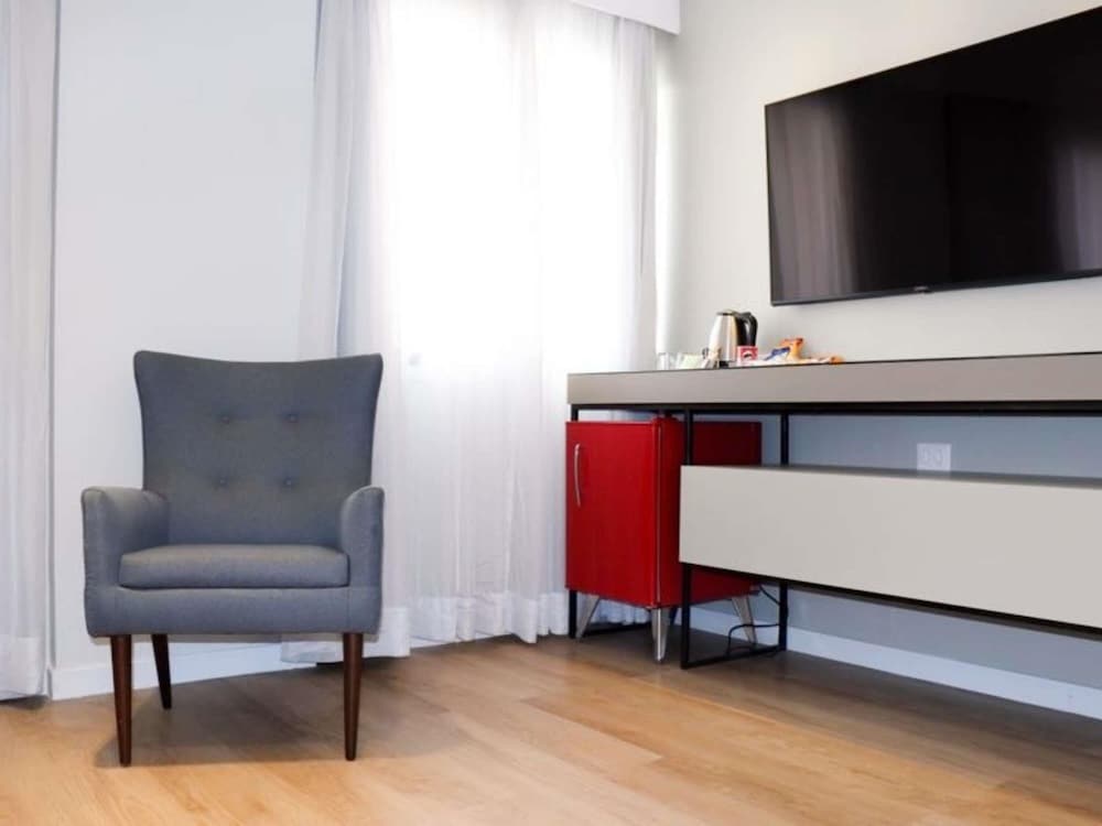 Habitación Deluxe con dos camas individuales del hotel Mercure Sao Paulo Vila Olimpia. Foto 6