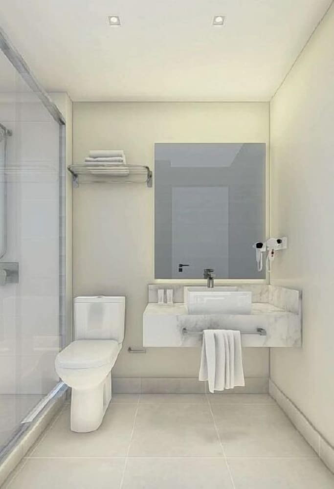 Habitación Deluxe con dos camas individuales del hotel Mercure Sao Paulo Vila Olimpia. Foto 8