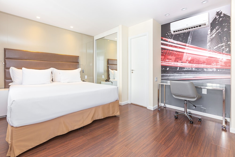 Suite Junior - cama Queen y sofá - cama con vistas a São Paulo del hotel Mercure Sao Paulo Vila Olimpia. Foto 2