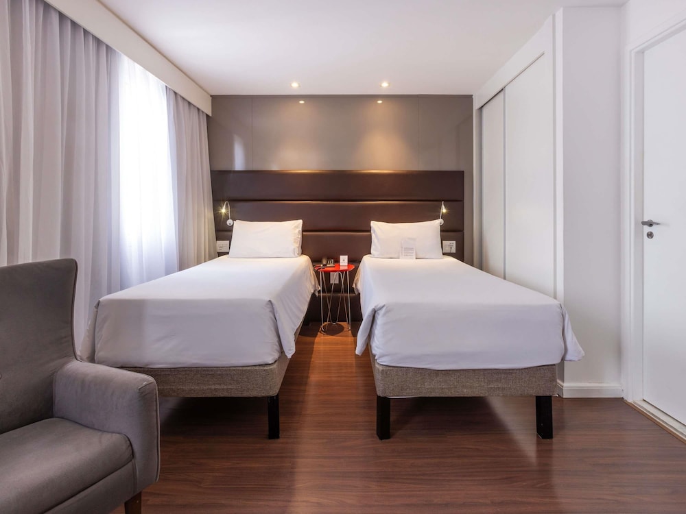 Suite Junior - 2 camas individuales + 1 sofá - cama - vistas a São Paulo del hotel Mercure Sao Paulo Vila Olimpia. Foto 1