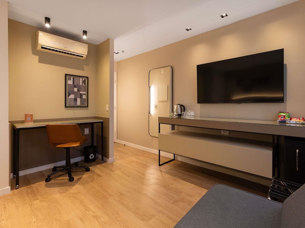 Habitación Deluxe con dos camas individuales del hotel Mercure Sao Paulo Vila Olimpia. Foto 8