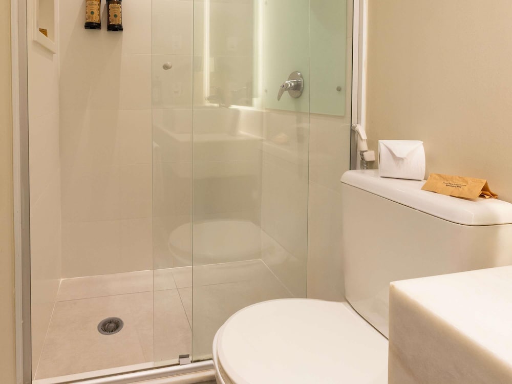Habitación Deluxe con dos camas individuales del hotel Mercure Sao Paulo Vila Olimpia. Foto 10