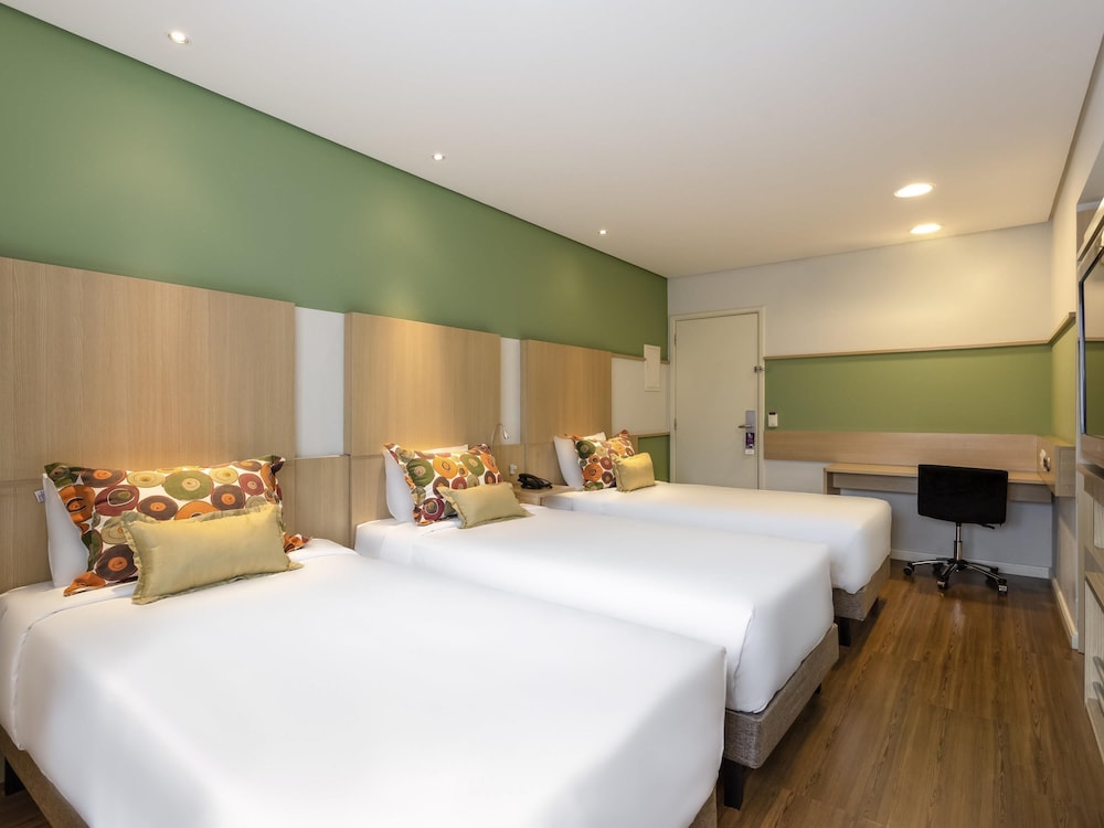 Apartamento con 3 camas individuales del hotel Mercure Sao Paulo Nacoes Unidas. Foto 1