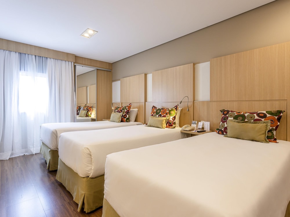 Apartamento Superior con 3 camas individuales y cocina equipada del hotel Mercure Sao Paulo Nacoes Unidas