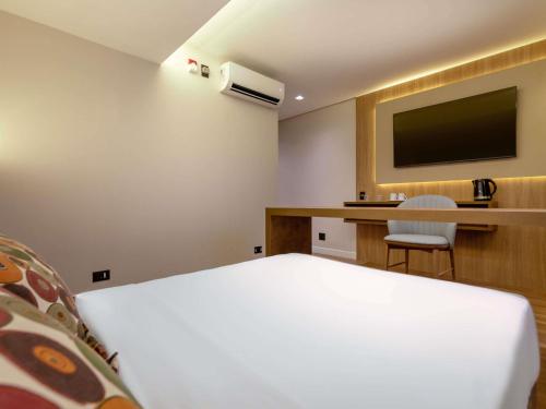 Apartamento superior adaptado con una cama doble del hotel Mercure Sao Paulo Nacoes Unidas. Foto 1