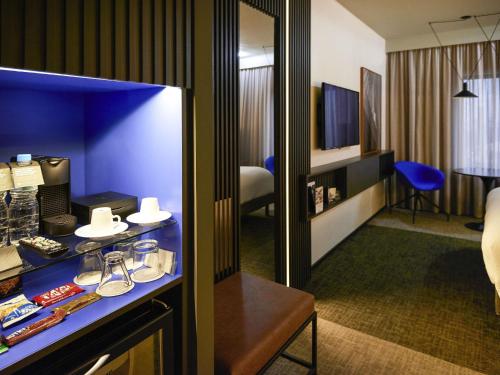 Habitación Premium Deluxe - cama grande del hotel Pullman Sao Paulo Ibirapuera. Foto 3