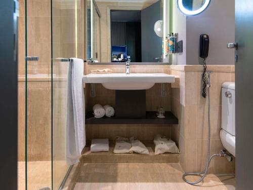 Habitación Premium Deluxe con cama grande y vistas a la ciudad del hotel Pullman Sao Paulo Ibirapuera. Foto 2
