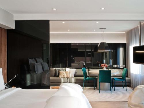 Suite Pullman vistas junto al Trousseau con vistas - Cama grande del hotel Pullman Sao Paulo Ibirapuera. Foto 1