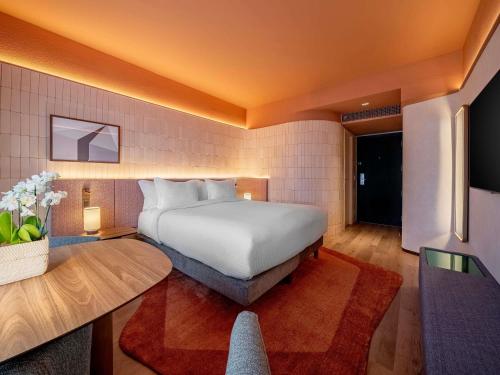 Habitación Executive Premium con vistas al parque del hotel Pullman Sao Paulo Ibirapuera. Foto 4