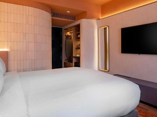 Habitación Executive Premium con vistas al parque del hotel Pullman Sao Paulo Ibirapuera. Foto 9