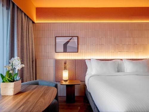 Habitación Executive Premium con vistas a la ciudad del hotel Pullman Sao Paulo Ibirapuera. Foto 1