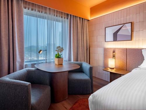 Habitación Executive Premium con vistas a la ciudad del hotel Pullman Sao Paulo Ibirapuera. Foto 9