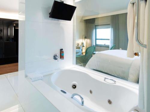Queen Executive Suite with View of Ibirapuera Park del hotel Pullman Sao Paulo Ibirapuera. Foto 4
