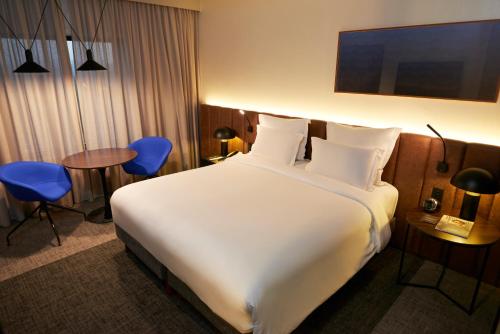 Habitación Premium Deluxe - cama grande del hotel Pullman Sao Paulo Ibirapuera. Foto 6