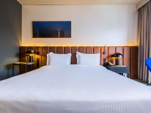 Habitación Doble Deluxe - Acceso para personas de movilidad reducida del hotel Pullman Sao Paulo Ibirapuera. Foto 7