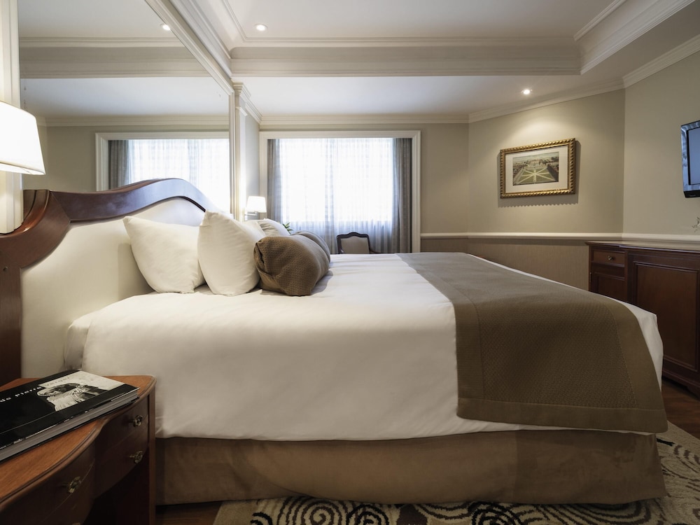 Habitación Executive con una cama king size del hotel Grand Mercure Sao Paulo Ibirapuera. Foto 2