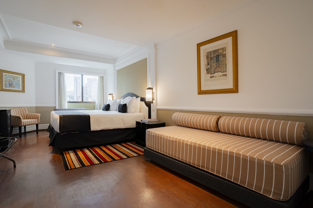 Habitación familiar con cama doble y una cama individual para un niño del hotel Grand Mercure Sao Paulo Ibirapuera. Foto 1
