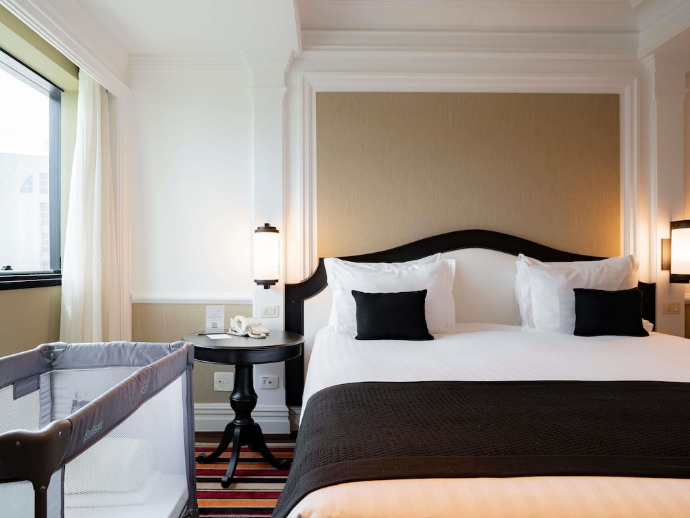Habitación familiar con cama doble y una cama individual para un niño del hotel Grand Mercure Sao Paulo Ibirapuera. Foto 3