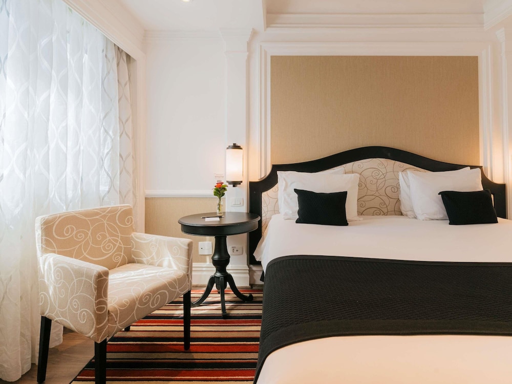 Habitación Deluxe con cama doble y balcón frente al Parque Ibirapuera del hotel Grand Mercure Sao Paulo Ibirapuera. Foto 5