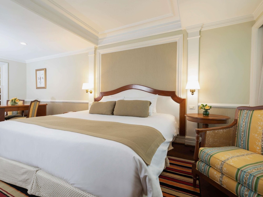 Habitación de categoría superior con una cama King Size del hotel Grand Mercure Sao Paulo Ibirapuera