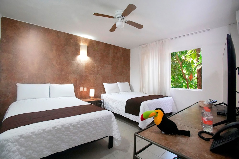 Habitación Deluxe del hotel Tukan Hotel Playa del Carmen. Foto 1