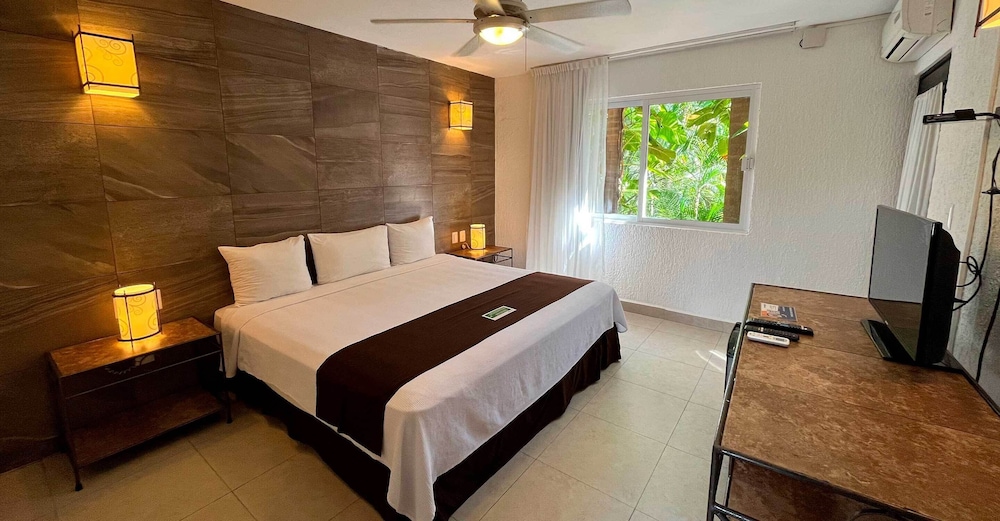 Habitación Deluxe del hotel Tukan Hotel Playa del Carmen. Foto 4