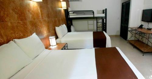 Suite Familiar del hotel Tukan Hotel Playa del Carmen. Foto 2