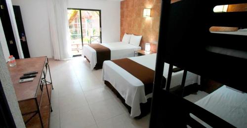 Suite Familiar del hotel Tukan Hotel Playa del Carmen. Foto 3