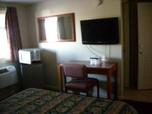 Habitación - No fumadores - Cama grande del hotel Royal Inn. Foto 1